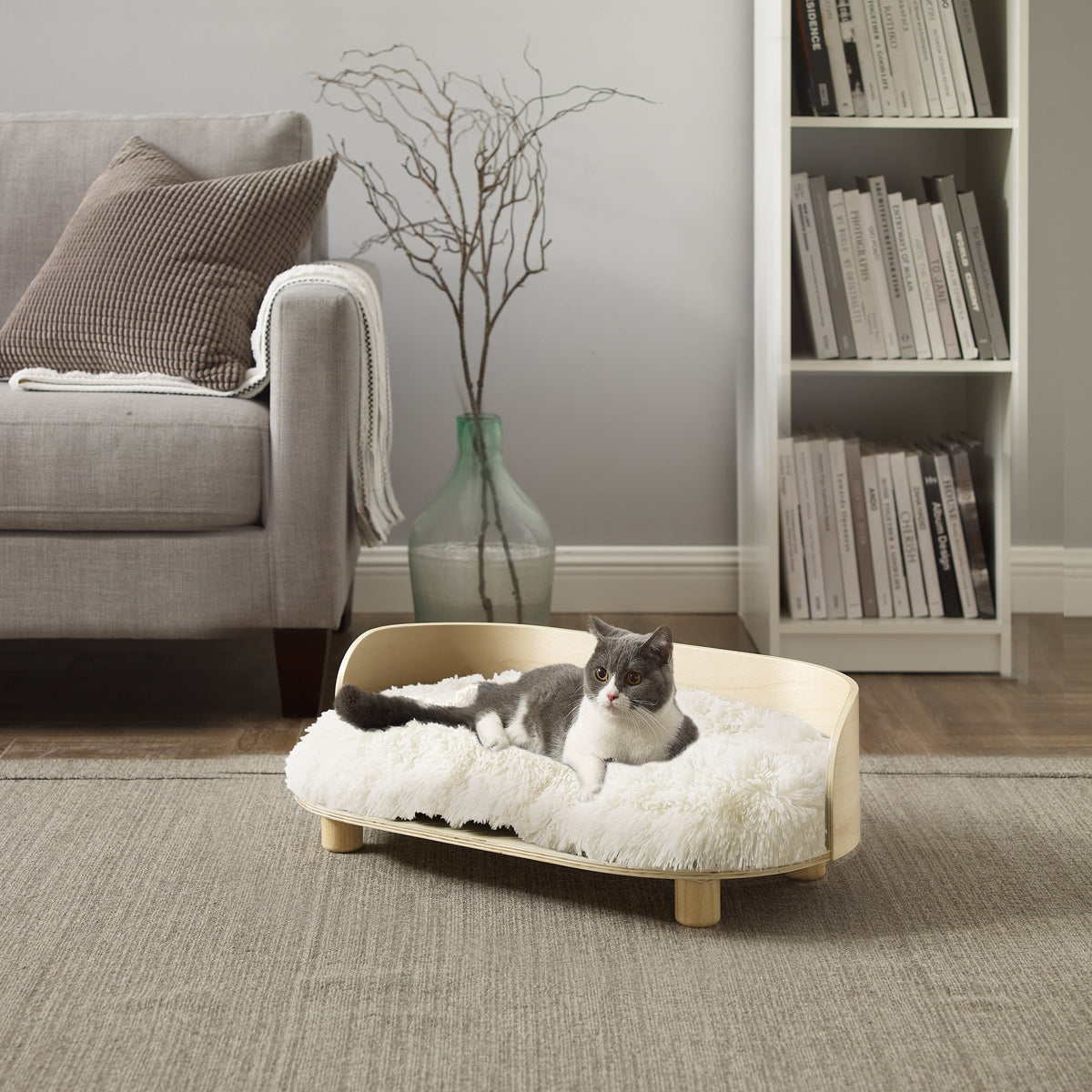 Cat resting in the Kuai Dog/Cat Bed Bent Wood Medium Light Brown